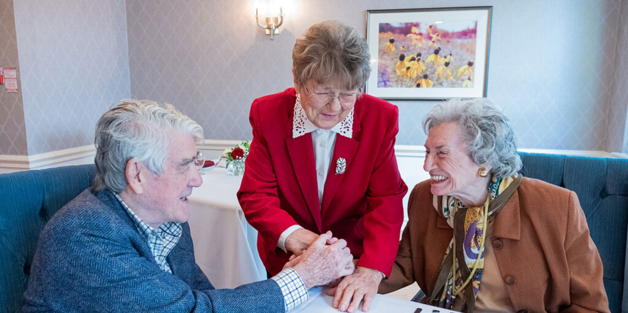 Three Tillsonburg Retirement residents smiling